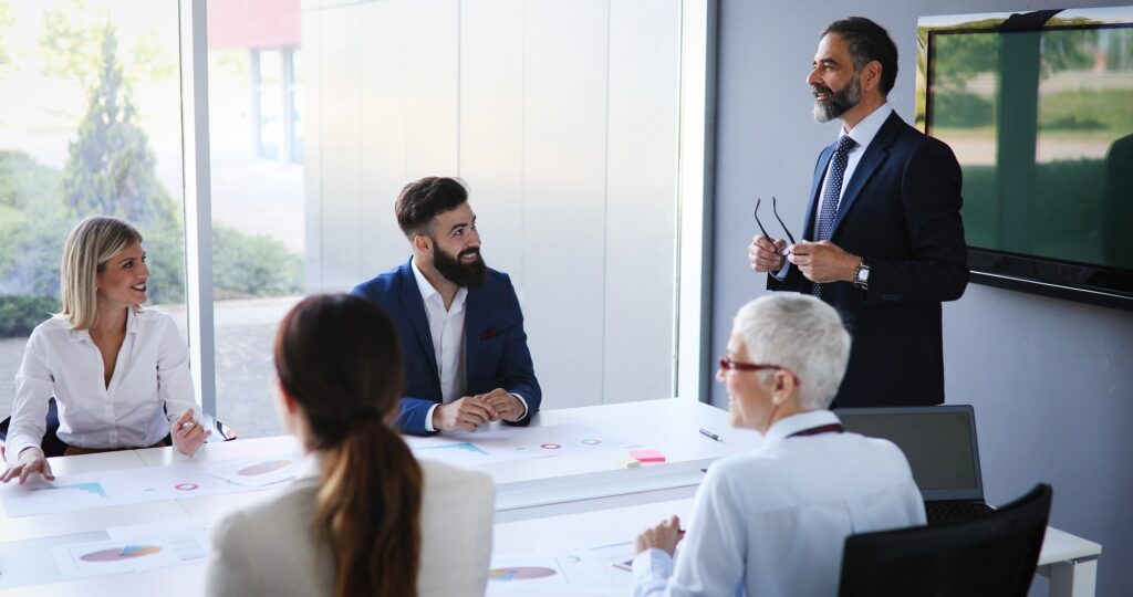 Business coworkers discussing new ideas and brainstorming in a modern office