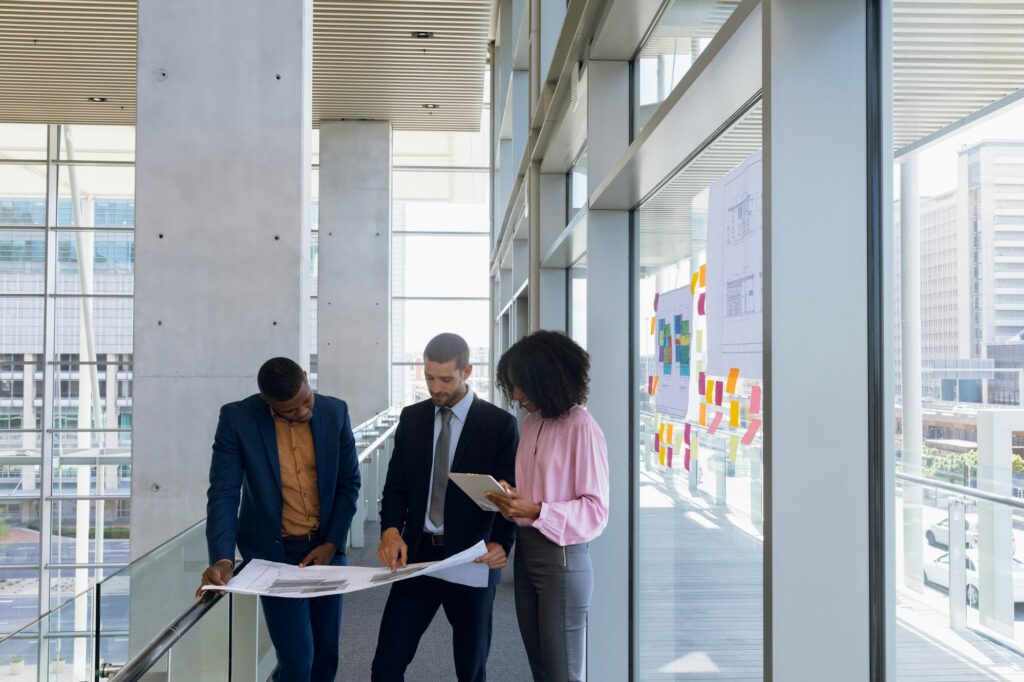 Diverse business team discussing plans in a modern office