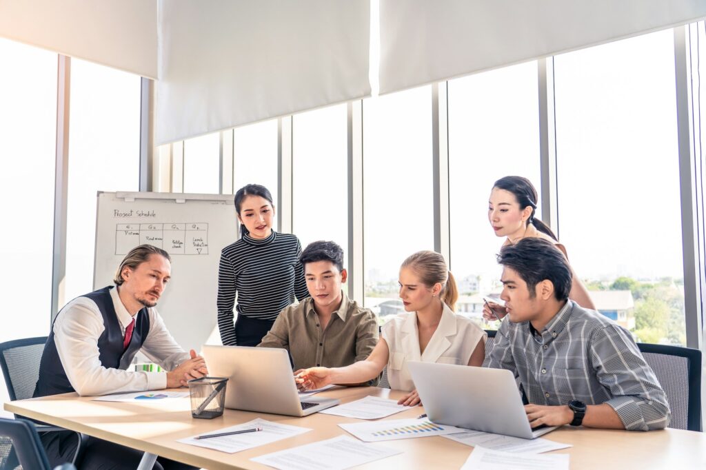 Group of business people brainstorm to solve problem and presentation in teamwork in office